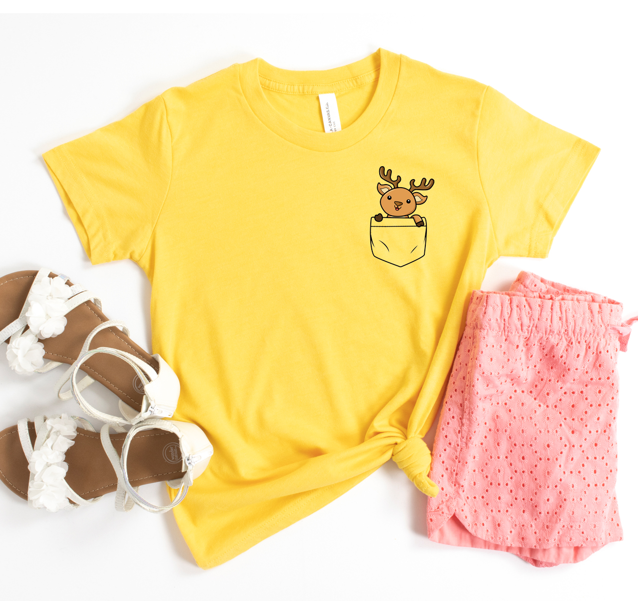 A stylish Deer Pocket T-shirt in various colors, showcasing its unisex design and soft fabric.