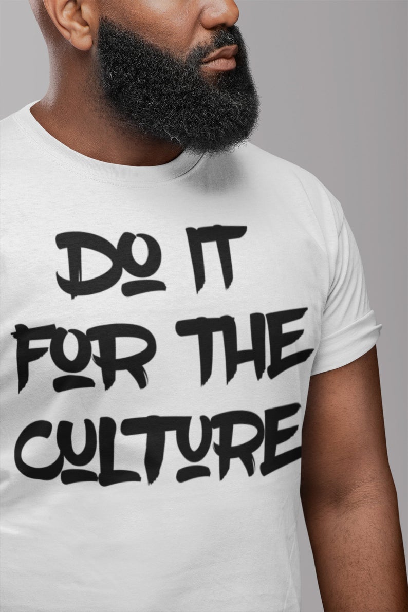 Do It For The Culture Shirt displayed on a mannequin, showcasing its unisex crew neck design and vibrant print.