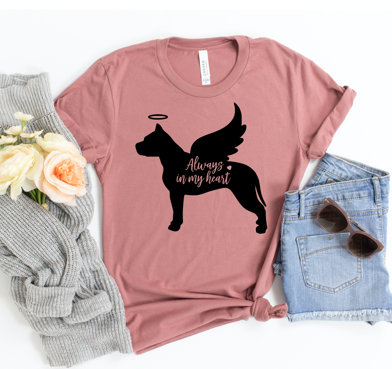 A stylish unisex Dog Always Win My Heart T-shirt made from soft cotton, featuring a heartwarming dog-themed design.