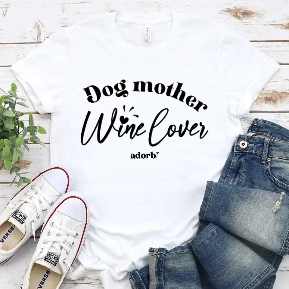 A stylish Dog Mother Wine Lover T-shirt in a solid color, made from soft ringspun cotton, featuring a fun design perfect for dog lovers.