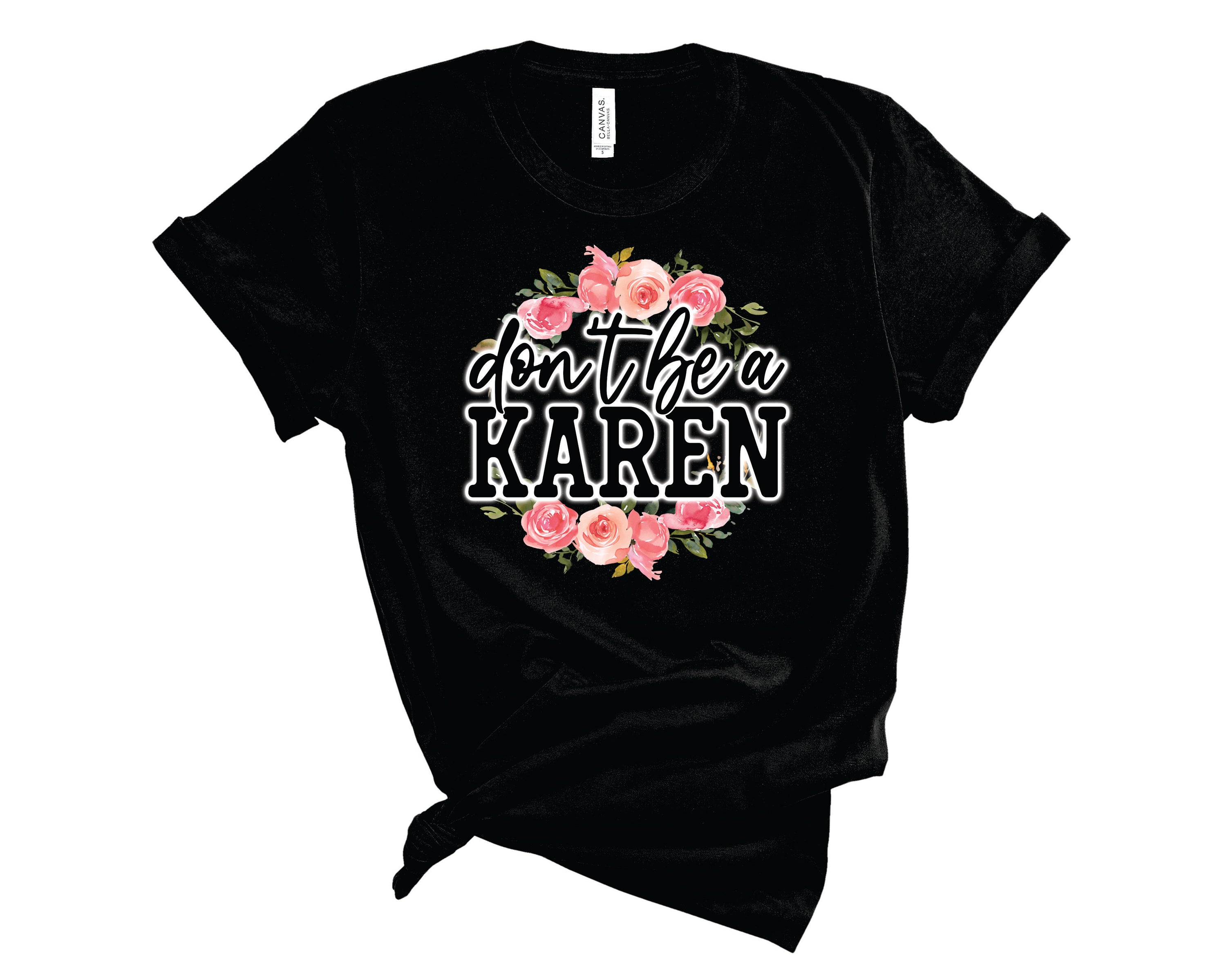 A unisex graphic tee featuring a floral frame design with the text 'Don't Be A Karen' in a stylish font.