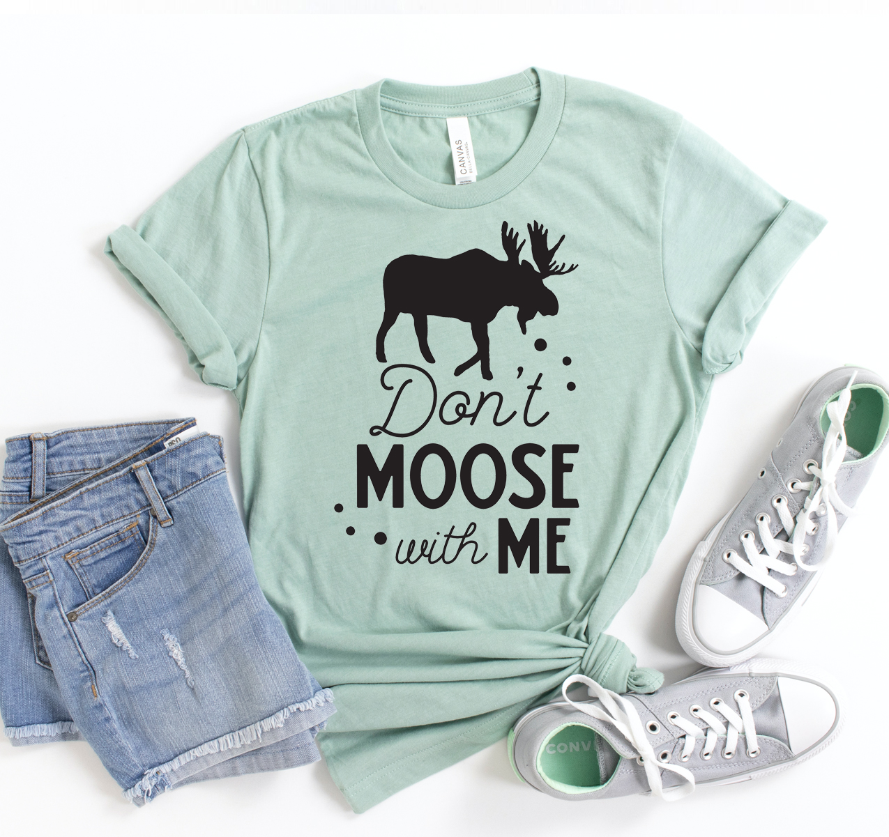 A stylish Don't Moose With Me T-shirt displayed on a mannequin, showcasing its unisex design and soft fabric.