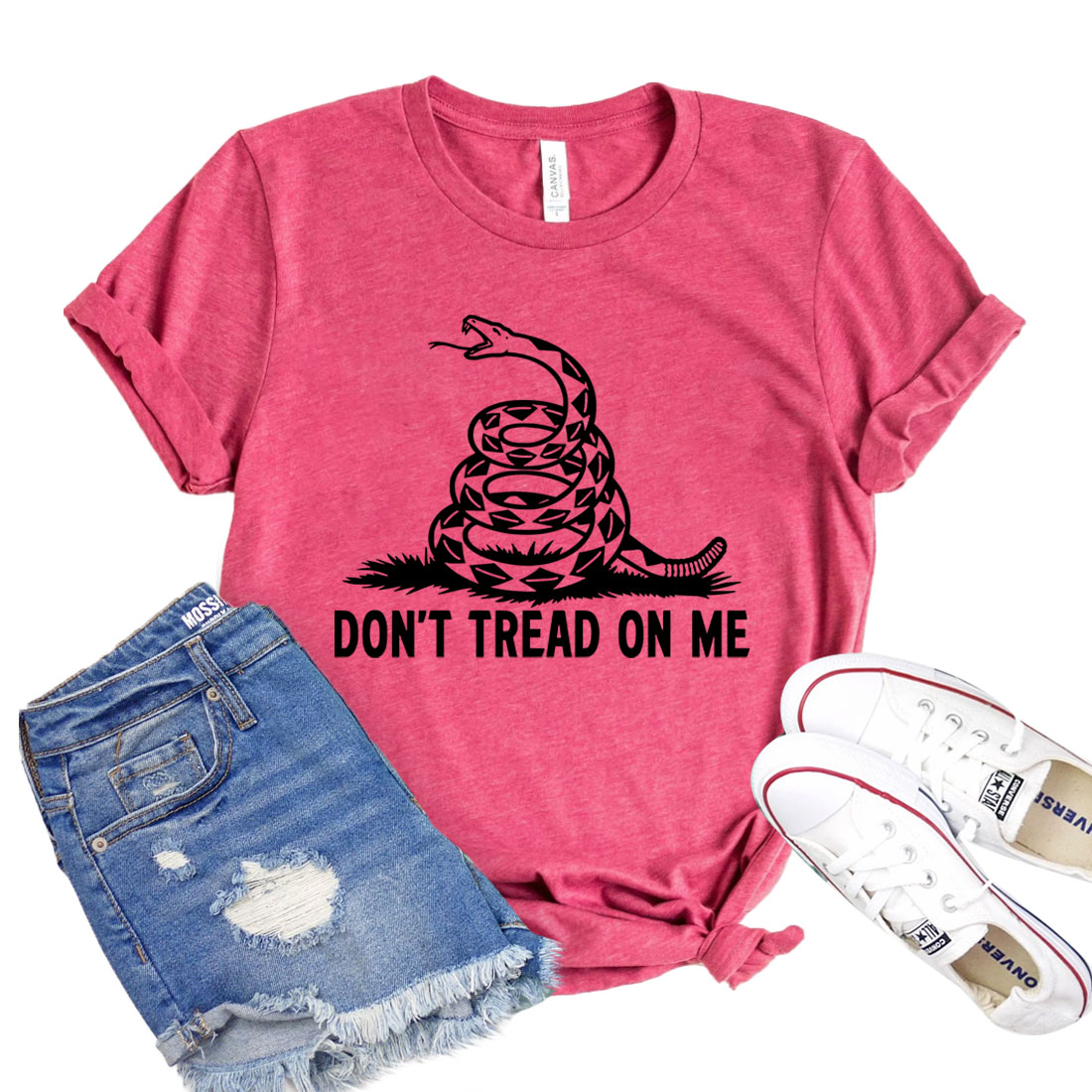 A classic Don't Tread On Me T-shirt featuring a bold design, made from soft airlume combed cotton, available in various sizes.