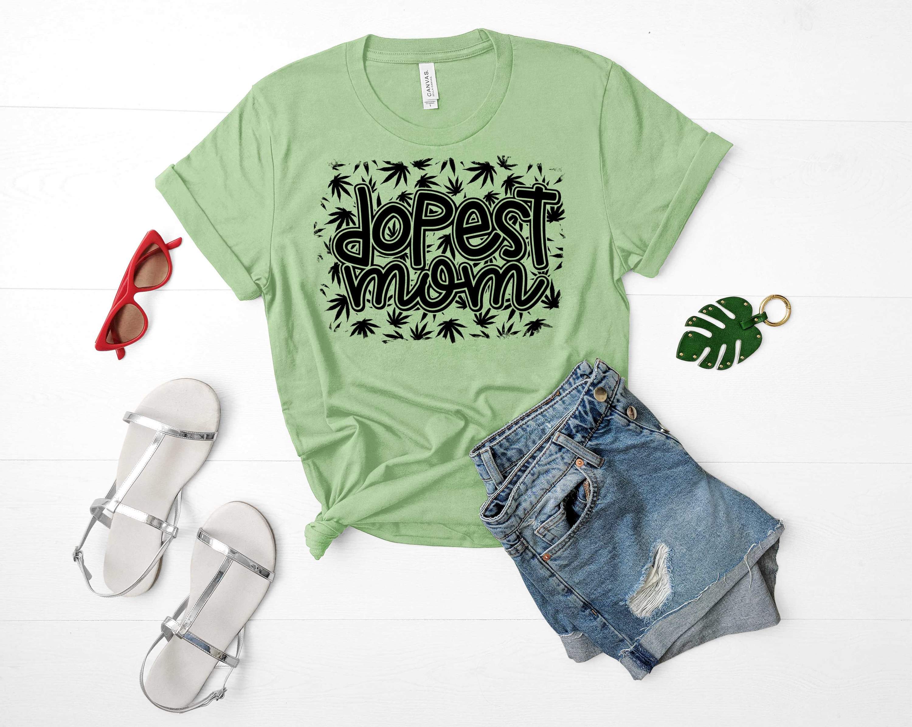 Dopest Mom Graphic Tee featuring a stylish design for mothers, made from soft fabric.