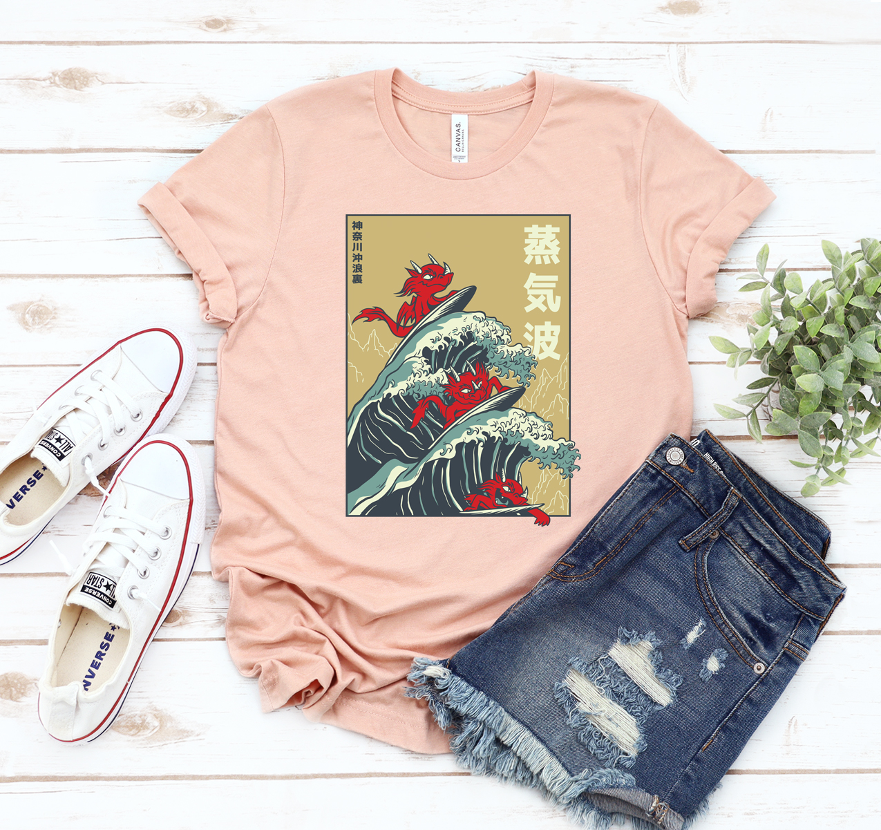 A vibrant Dragons Surfing Waves T-shirt featuring colorful graphics of dragons riding waves, perfect for surf enthusiasts.