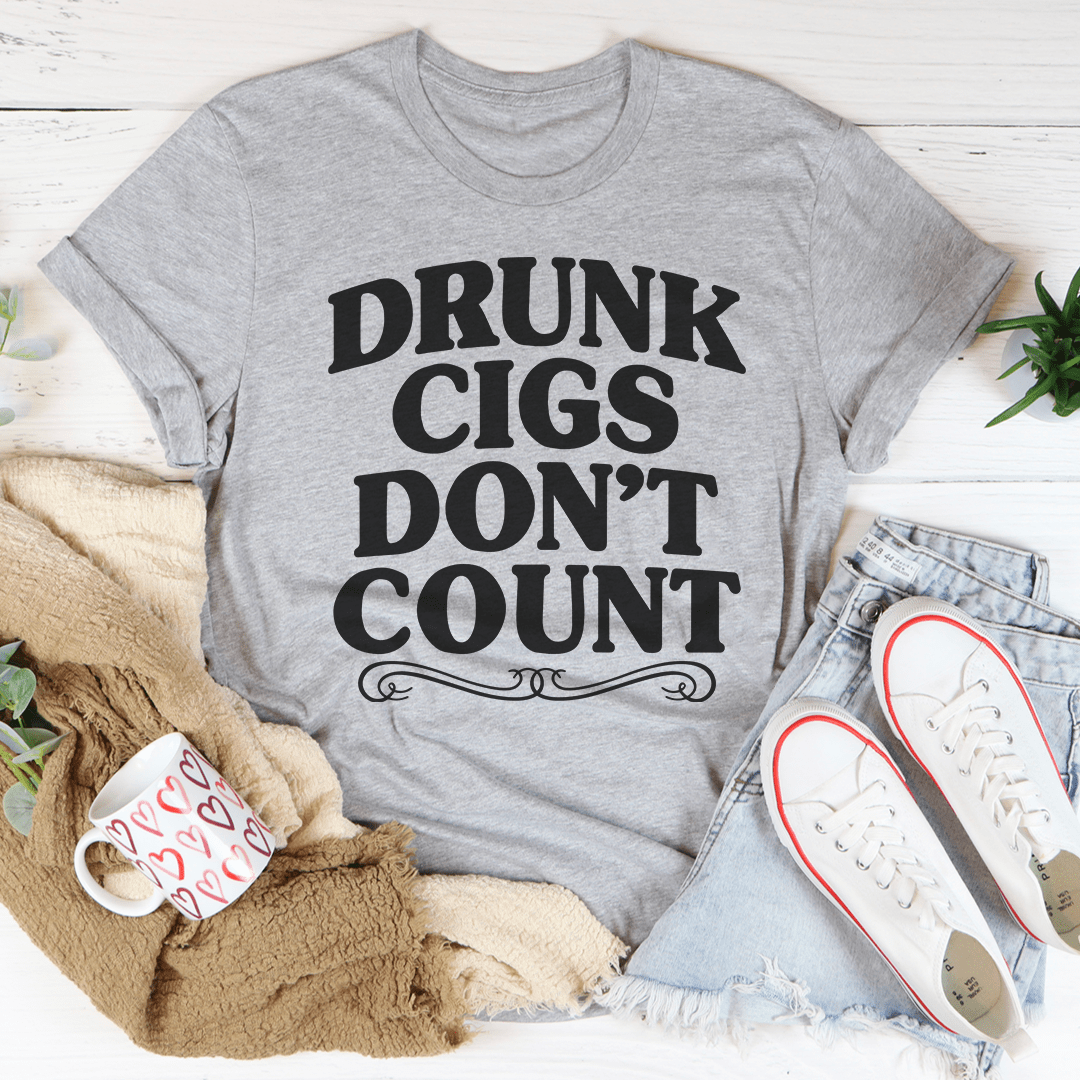 A stylish Drunk Cigs Don't Count Tee featuring a unique digital print on soft, durable fabric, perfect for casual wear.