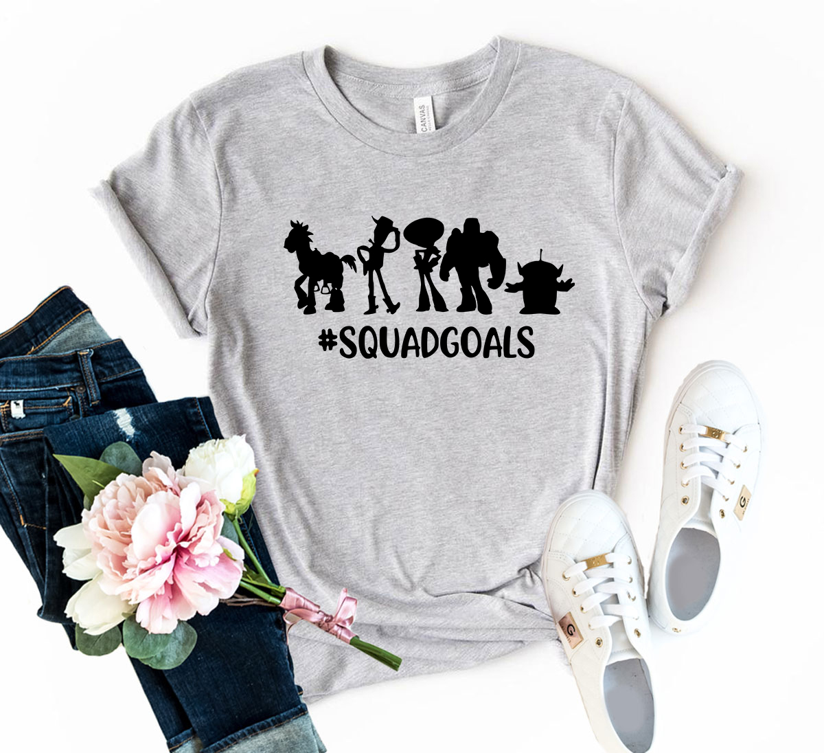 DT0103 Squad Goals Unisex T-shirt in various colors, showcasing its soft fabric and stylish design.