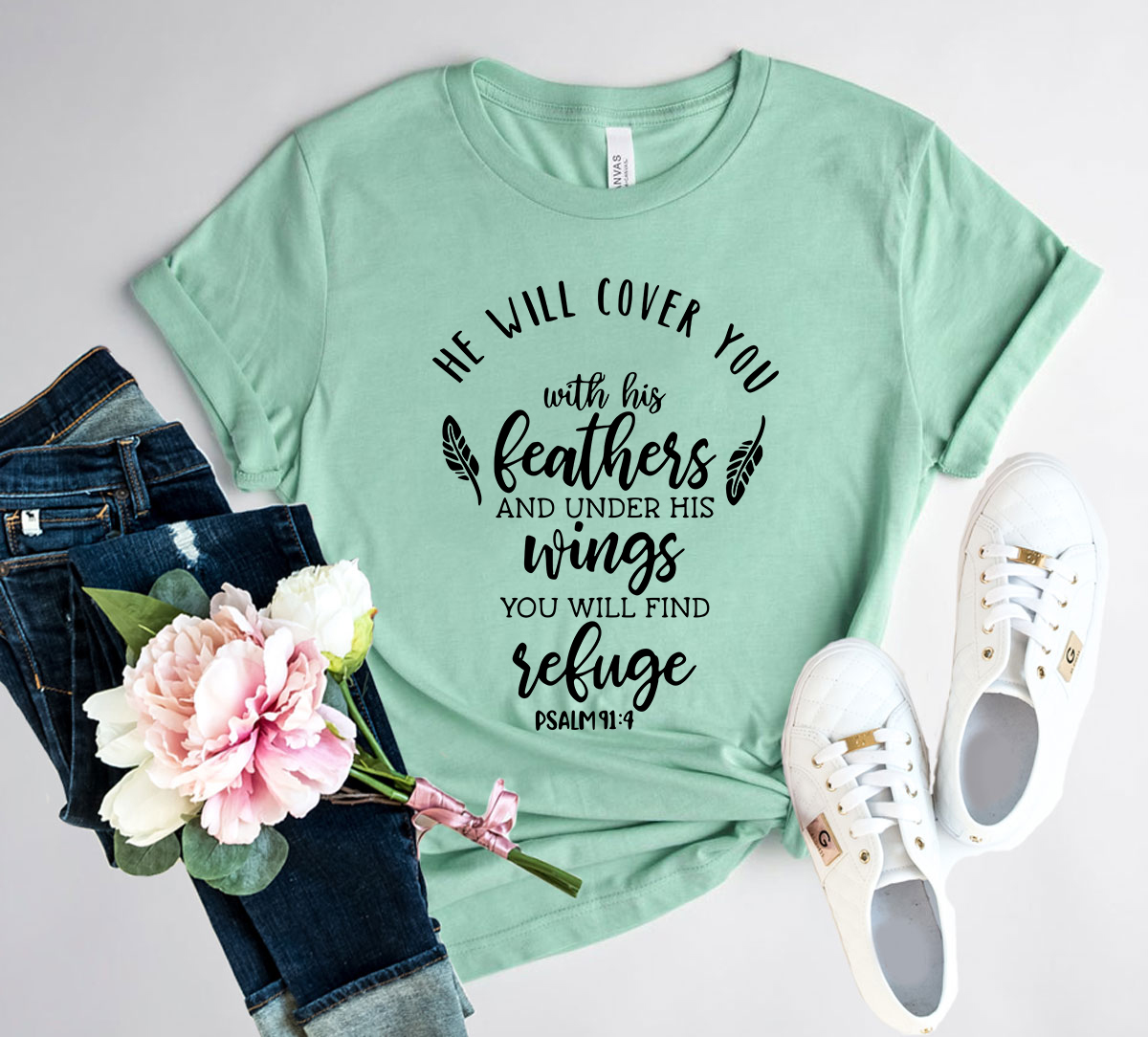 DT0120 He Will Cover You With His Wings Shirt in various colors, showcasing its soft fabric and stylish design.