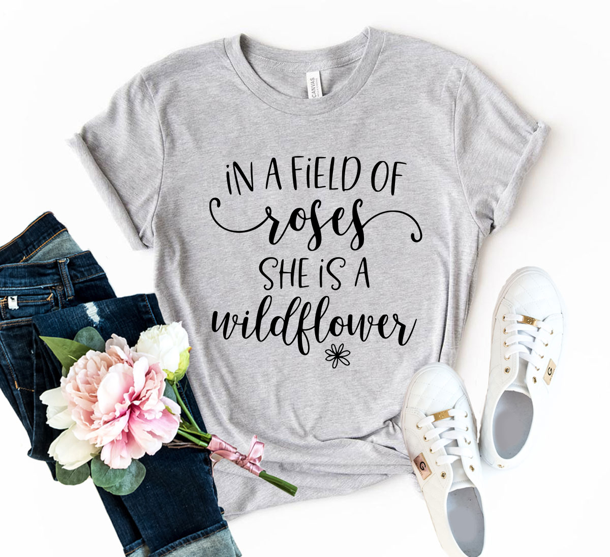 DT0137 In A Field Of Roses I'm A Wildflower Shirt displayed in multiple colors, showcasing its soft fabric and stylish design.