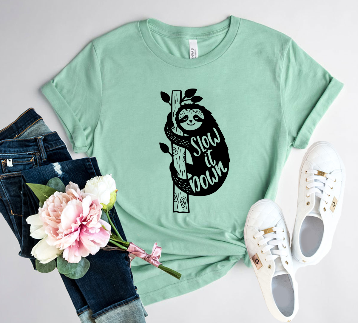 DT0173 Slow It Down Shirt in various colors, showcasing its soft fabric and classic crew neck design.