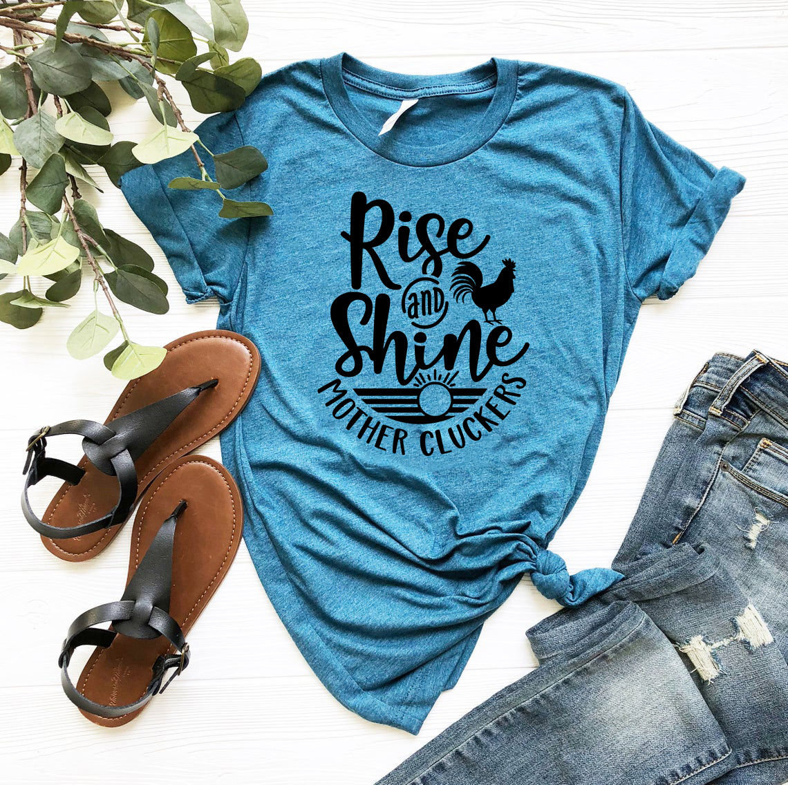 DT0866 Rise And Shine Mother Cluckers unisex T-shirt in various colors, showcasing its soft fabric and stylish design.