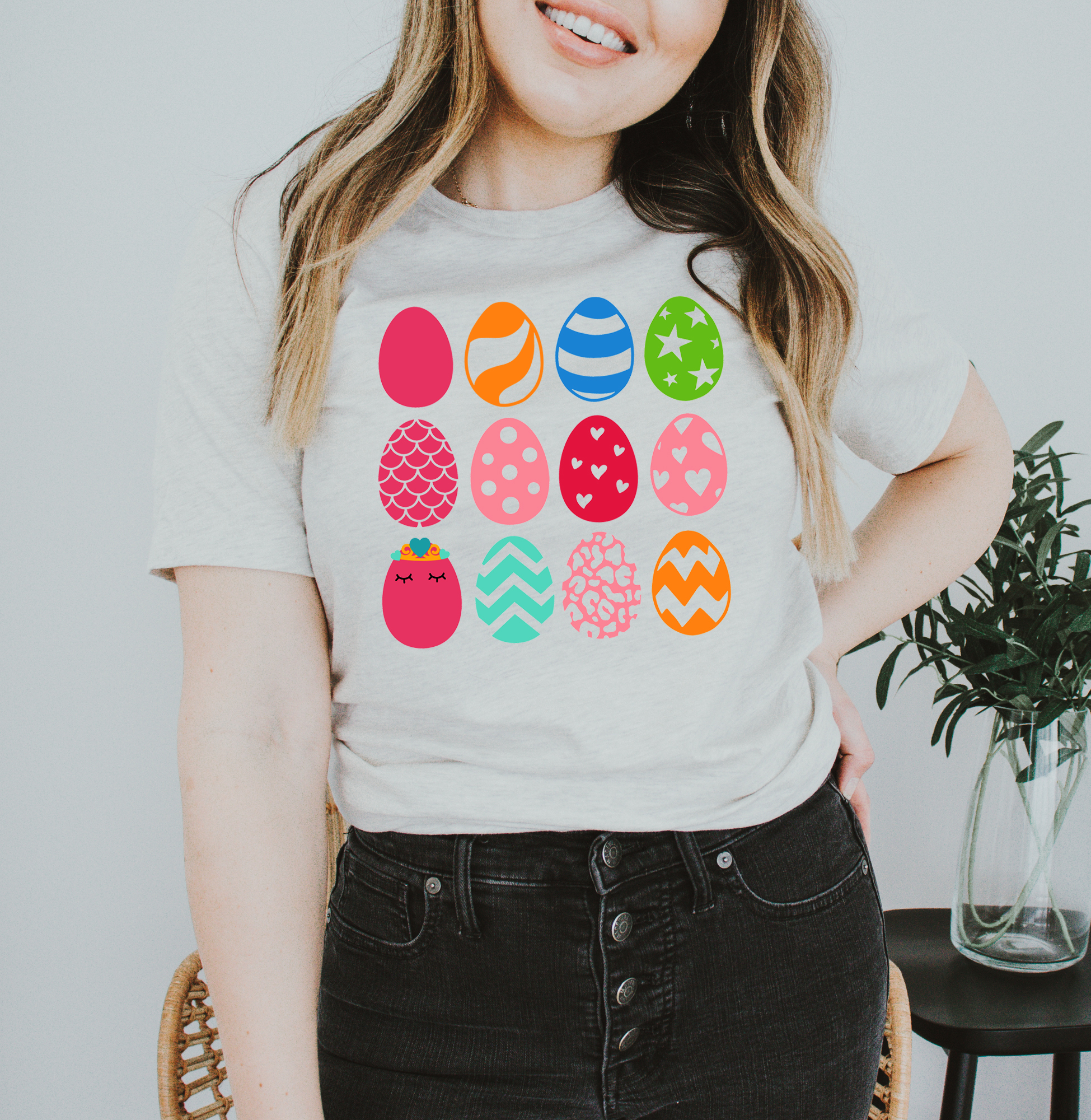 Easter Eggs T-shirt featuring vibrant colors and a playful design, made from soft ring spun cotton for comfort.
