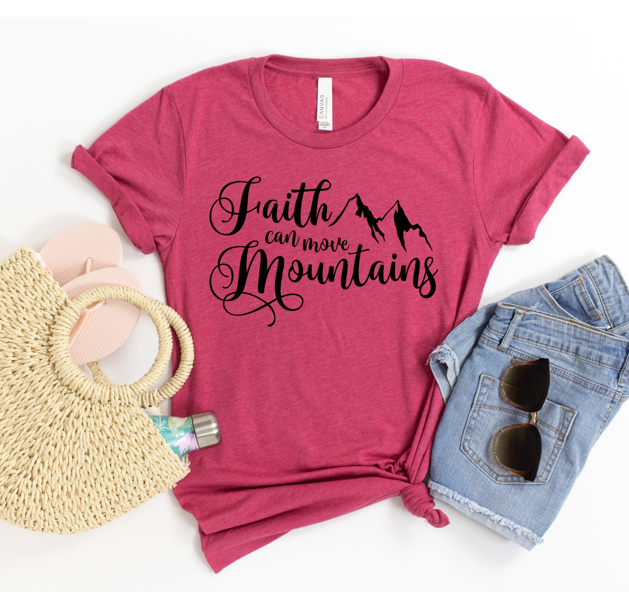 Faith Can Move Mountains T-shirt featuring inspirational text on a classic unisex Bella Canvas design.