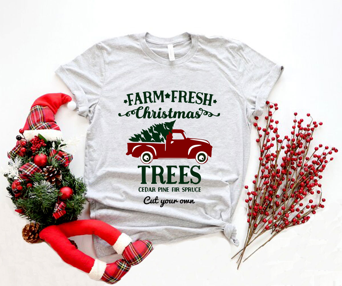A cozy unisex Farm Fresh Christmas Shirt in various colors, showcasing its soft fabric and festive design.