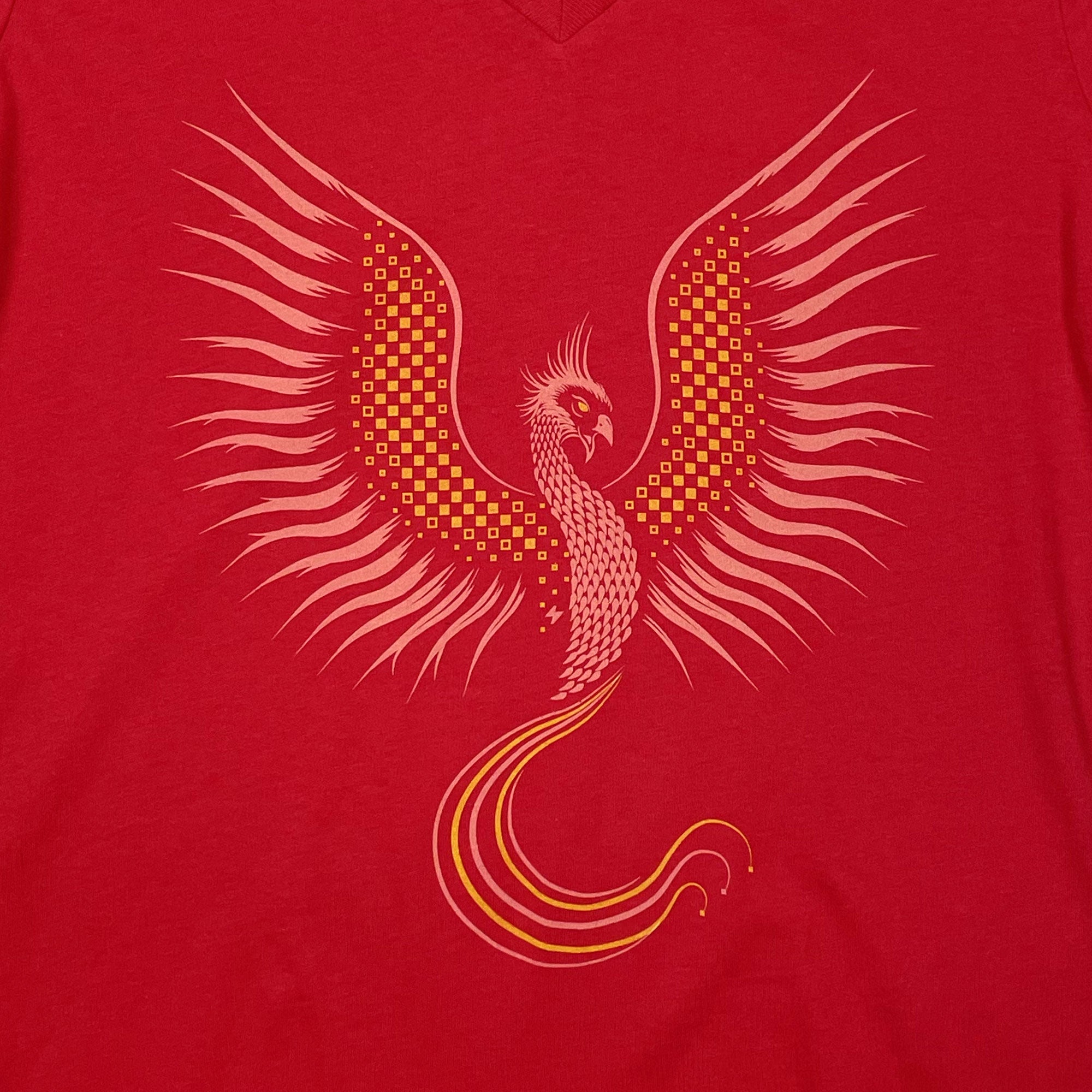 Fired Up Women's Relaxed V-neck T-shirt in red featuring a vibrant phoenix graphic design, symbolizing resilience and ambition.