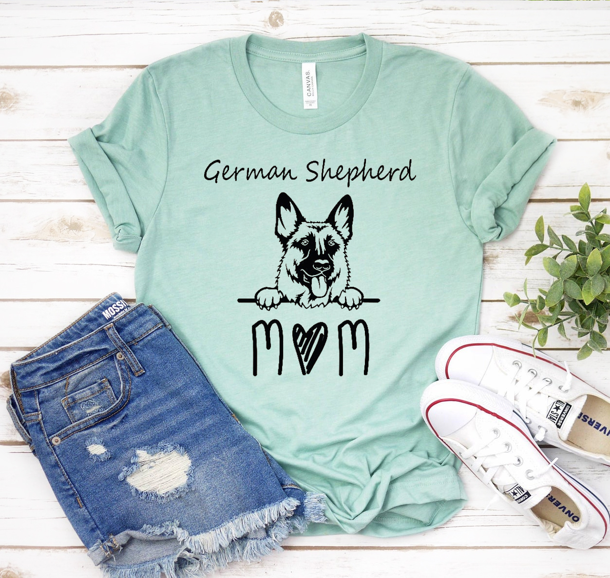A stylish German Shepherd Mom T-shirt made from soft cotton, featuring a classic unisex design suitable for dog lovers.