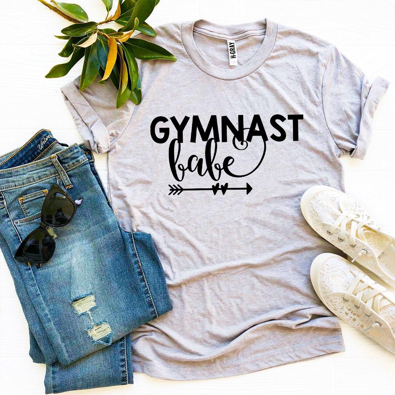 Gymnast Babe T-shirt made from premium ring spun cotton, featuring a vibrant flex print design, available in various sizes.