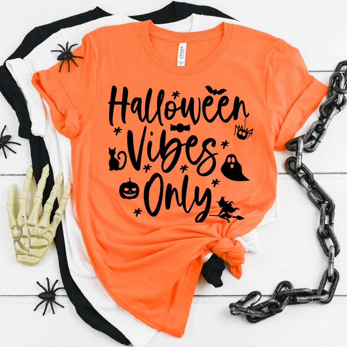 Halloween Vibes Only T-shirt made of premium ring spun cotton, featuring a vibrant Halloween-themed design.
