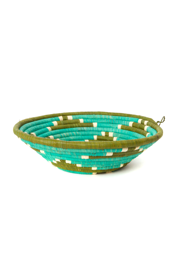 Handwoven sisal coiled Uganda raffia basket featuring vibrant colors and a unique design, perfect for storage or wall decor.