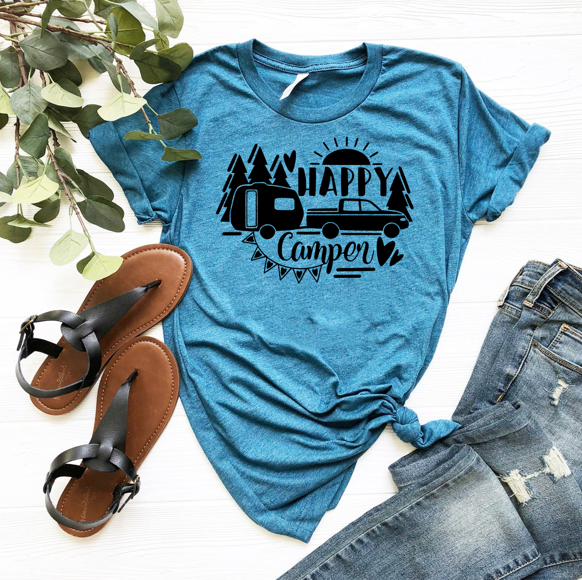 Happy Camper Shirt in various colors, showcasing its soft fabric and stylish design.