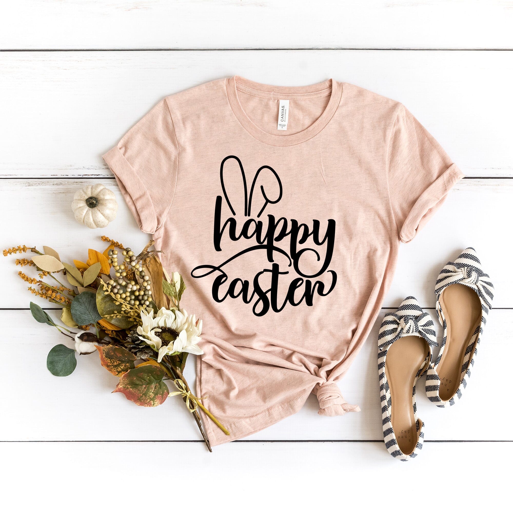 Happy Easter Bunny Ears T-Shirt featuring a cute bunny ears design, made from soft Ringspun Cotton fabric.