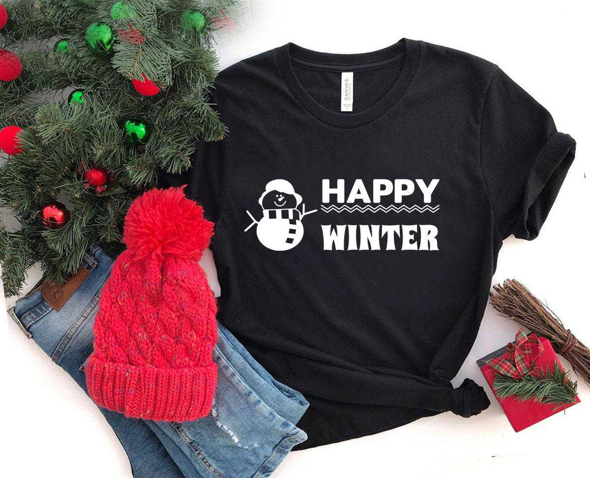 Happy Winter Shirt in various colors, showcasing its soft fabric and unisex design.