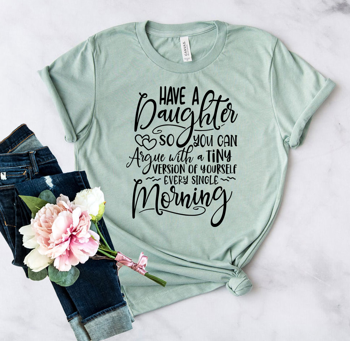 Unisex T-shirt featuring the phrase 'Have A Daughter So You Can Argue With' in a stylish font, available in various colors.
