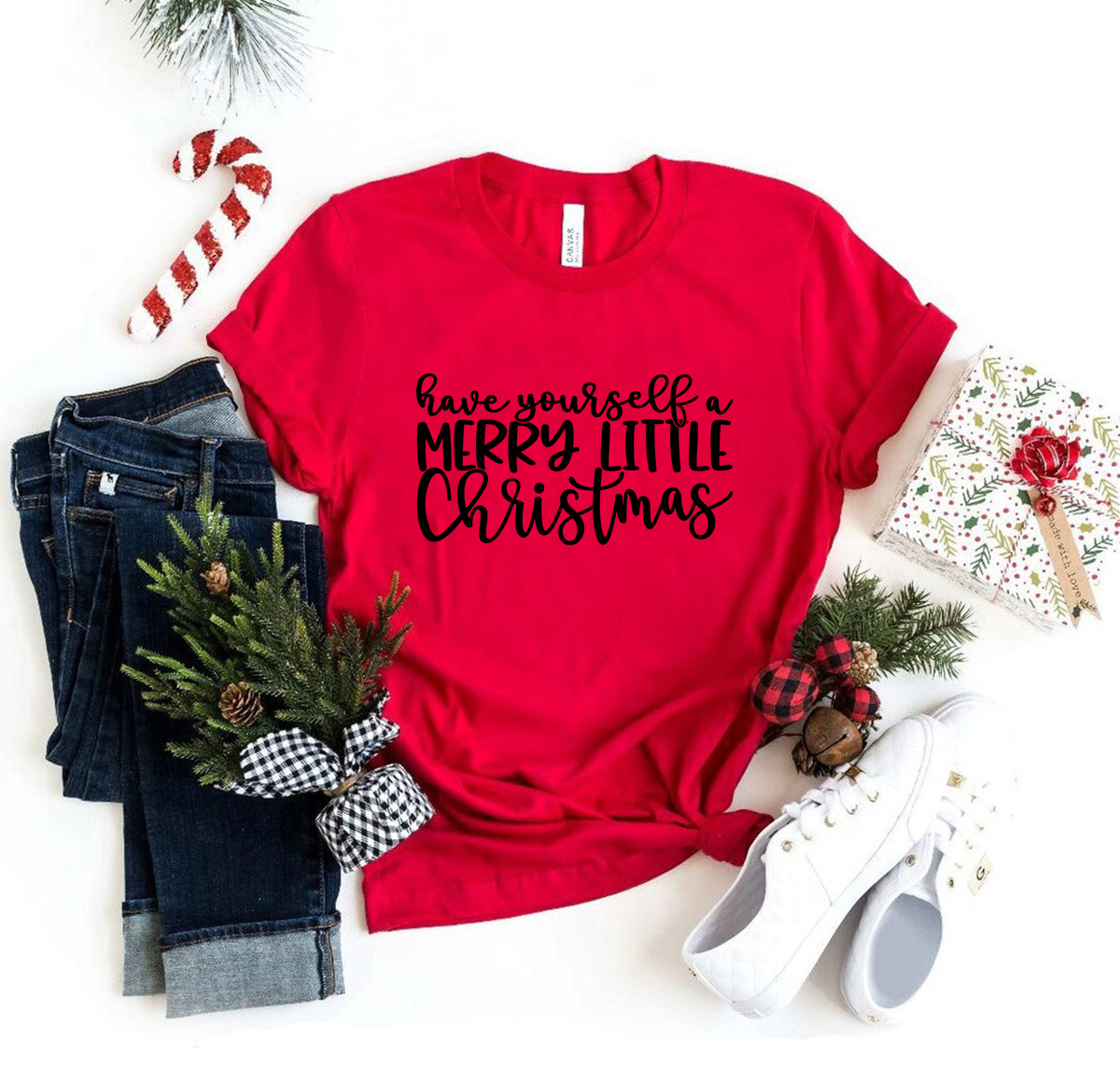Unisex Merry Little Christmas Shirt in various colors, showcasing a festive design perfect for holiday celebrations.