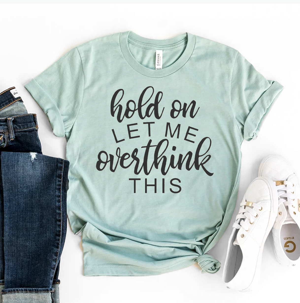 Hold On Let Me Overthink This T-shirt made from premium ring spun cotton, featuring a humorous print in a stylish design.
