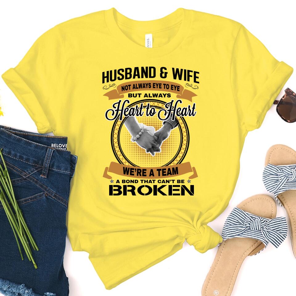 Husband & Wife Heart To Heart T-Shirt displayed on a neutral background, showcasing its comfortable fabric and modern design.