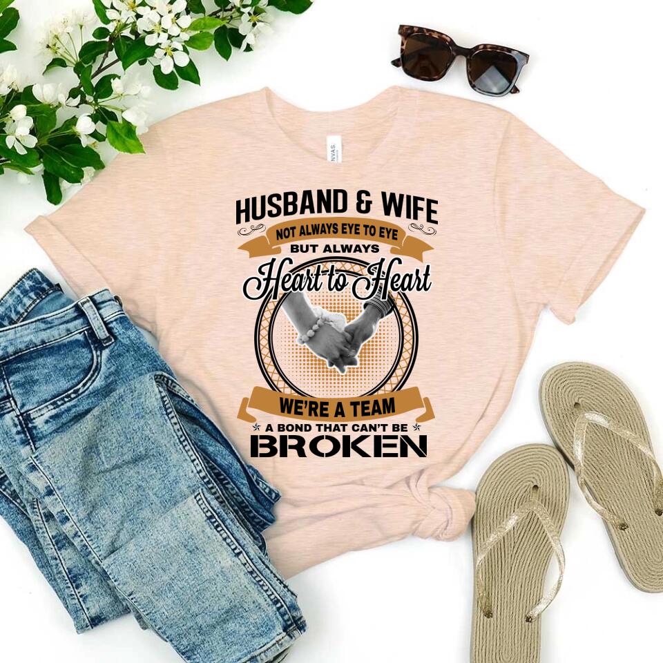 Husband & Wife Heart To Heart T-Shirt displayed on a neutral background, showcasing its comfortable fabric and modern design.