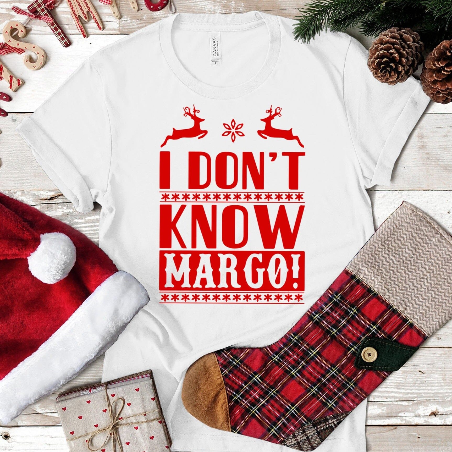I Don't Know Margo! Christmas Tee featuring a festive design, made from 100% Ringspun Cotton, displayed on a mannequin.