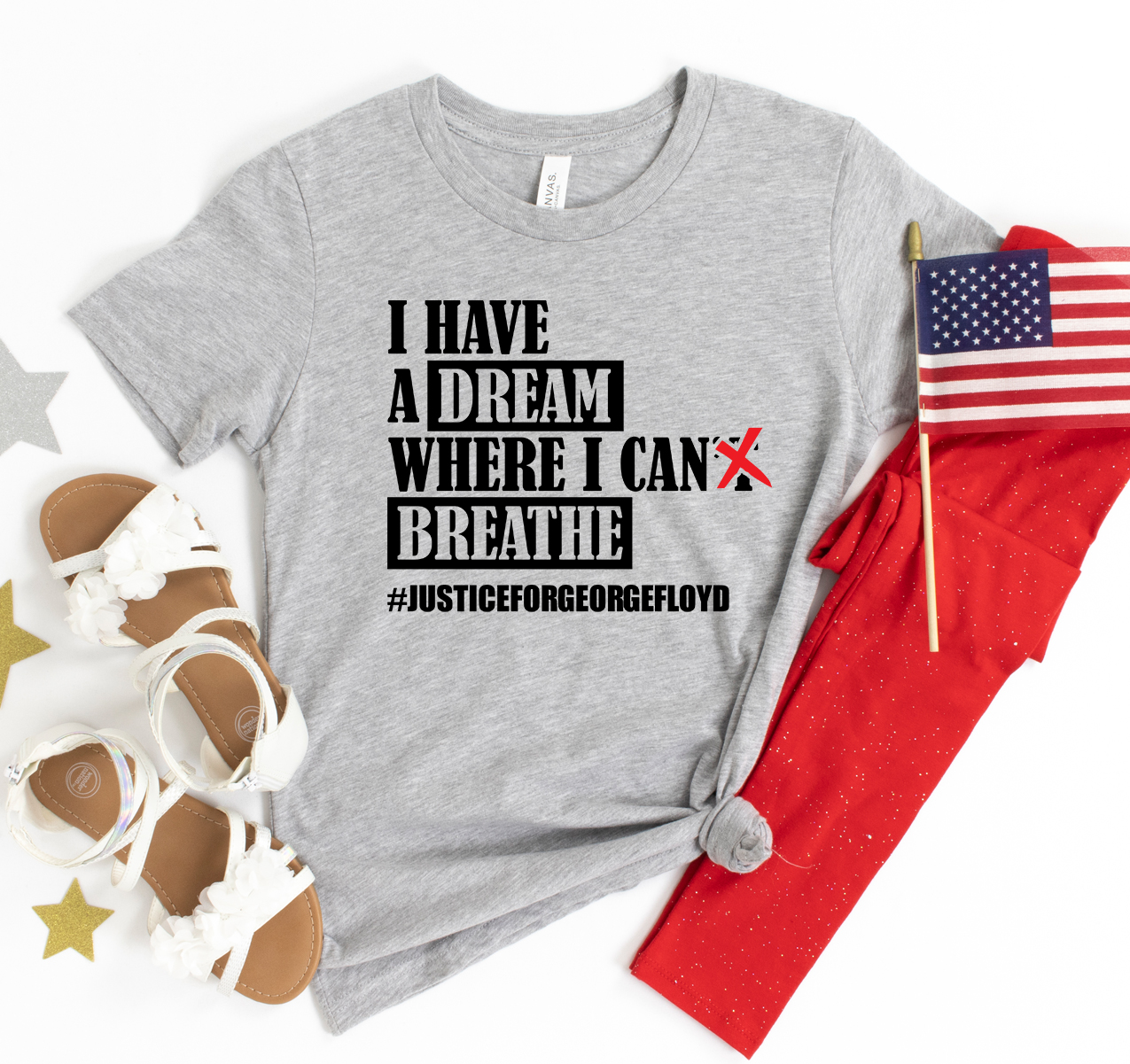 A soft, premium quality T-shirt featuring the phrase 'I Have a Dream Where I Can Breathe' in vibrant print, showcasing its comfortable fit.