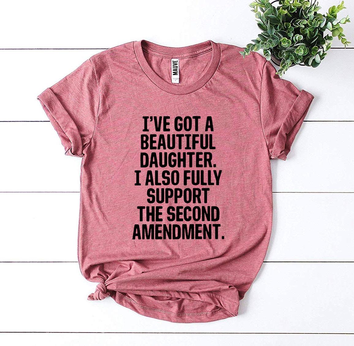 A stylish 'I have Got a Beautiful Daughter' T-shirt made from premium ring spun cotton, featuring a vibrant flex print design.