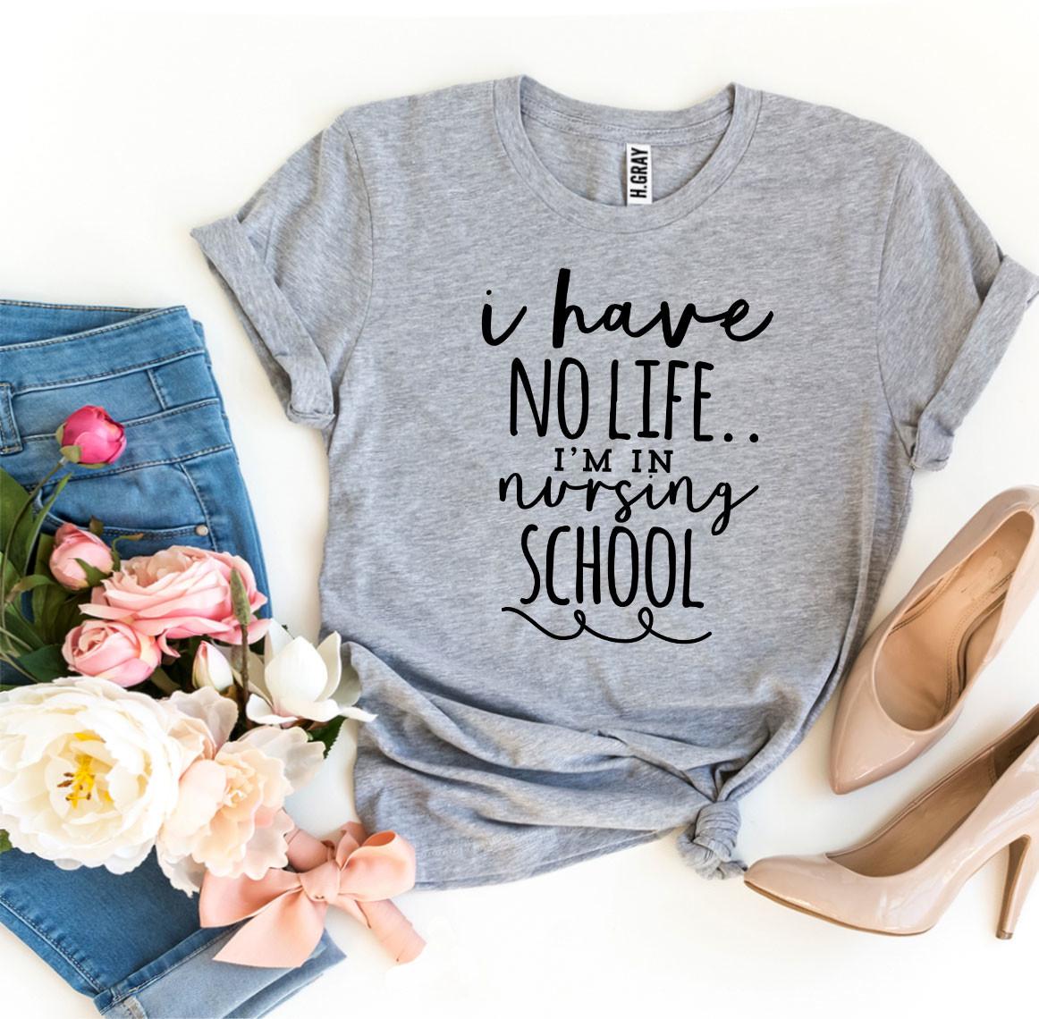 A stylish black T-shirt with the phrase 'I Have No Life I'm In Nursing School' printed in bold white letters, showcasing a comfortable fit.