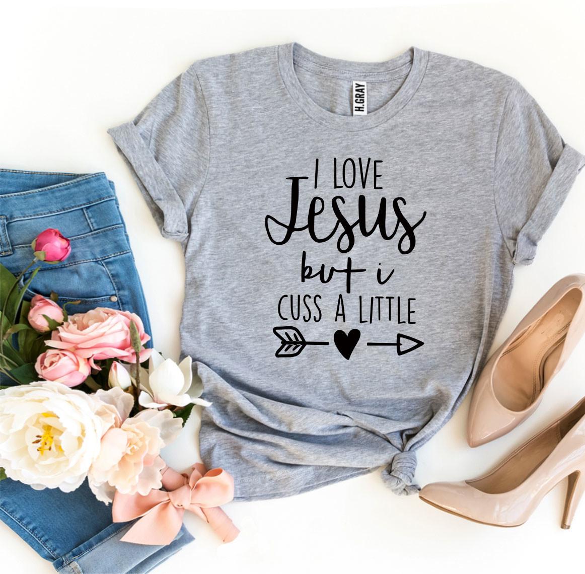 I Love Jesus But I Cuss a Little T-shirt in premium quality cotton with a humorous design.