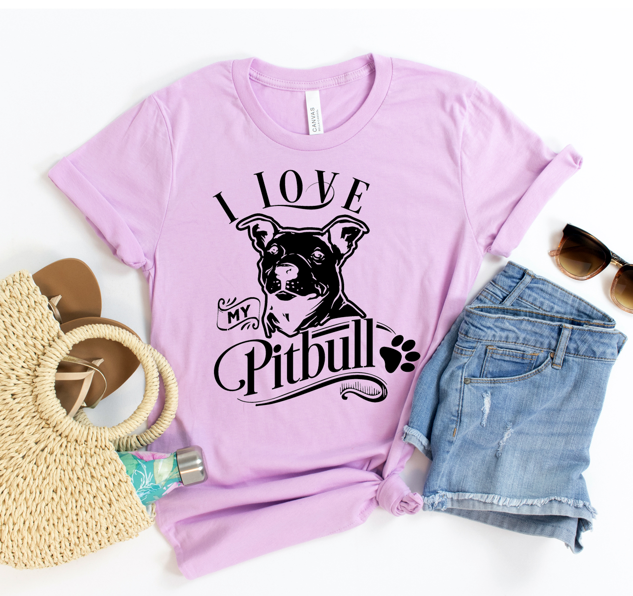 I Love My Pitbull T-shirt displayed on a hanger, featuring a bold graphic design and soft fabric.