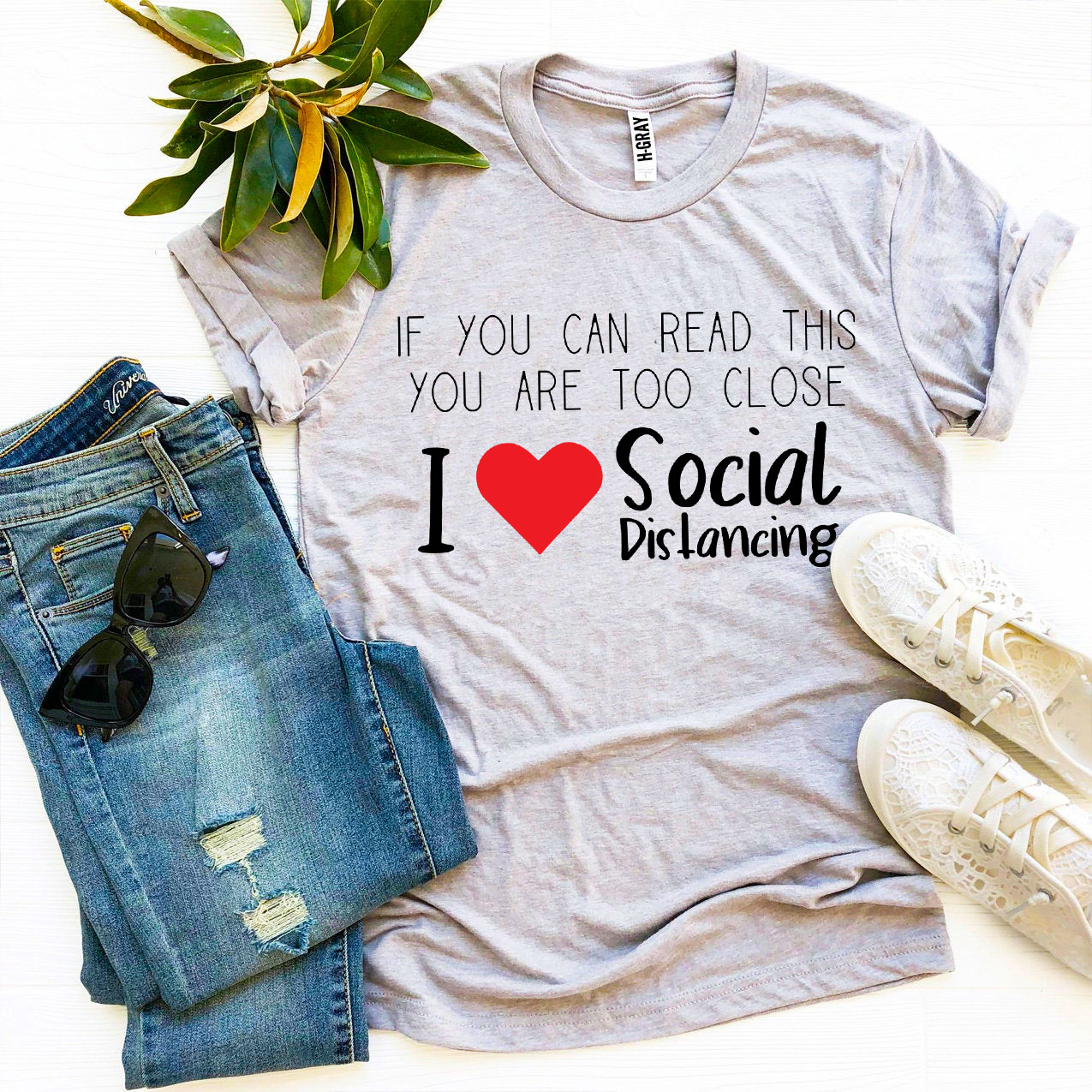 I Love Social Distancing T-shirt made of soft ring spun cotton with a vibrant print, available in various sizes.