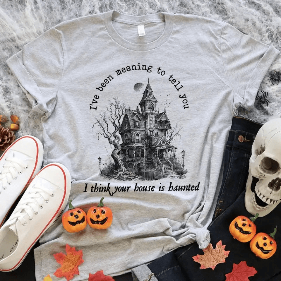 I Think You're House Is Haunted Halloween T-shirt featuring a spooky design, made from 100% Ringspun Cotton, perfect for Halloween celebrations.