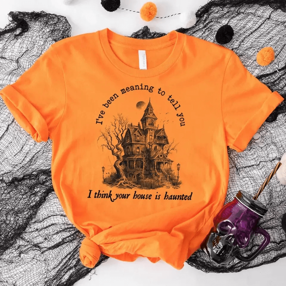 I Think You're House Is Haunted Halloween T-shirt featuring a spooky design, made from 100% Ringspun Cotton, perfect for Halloween celebrations.