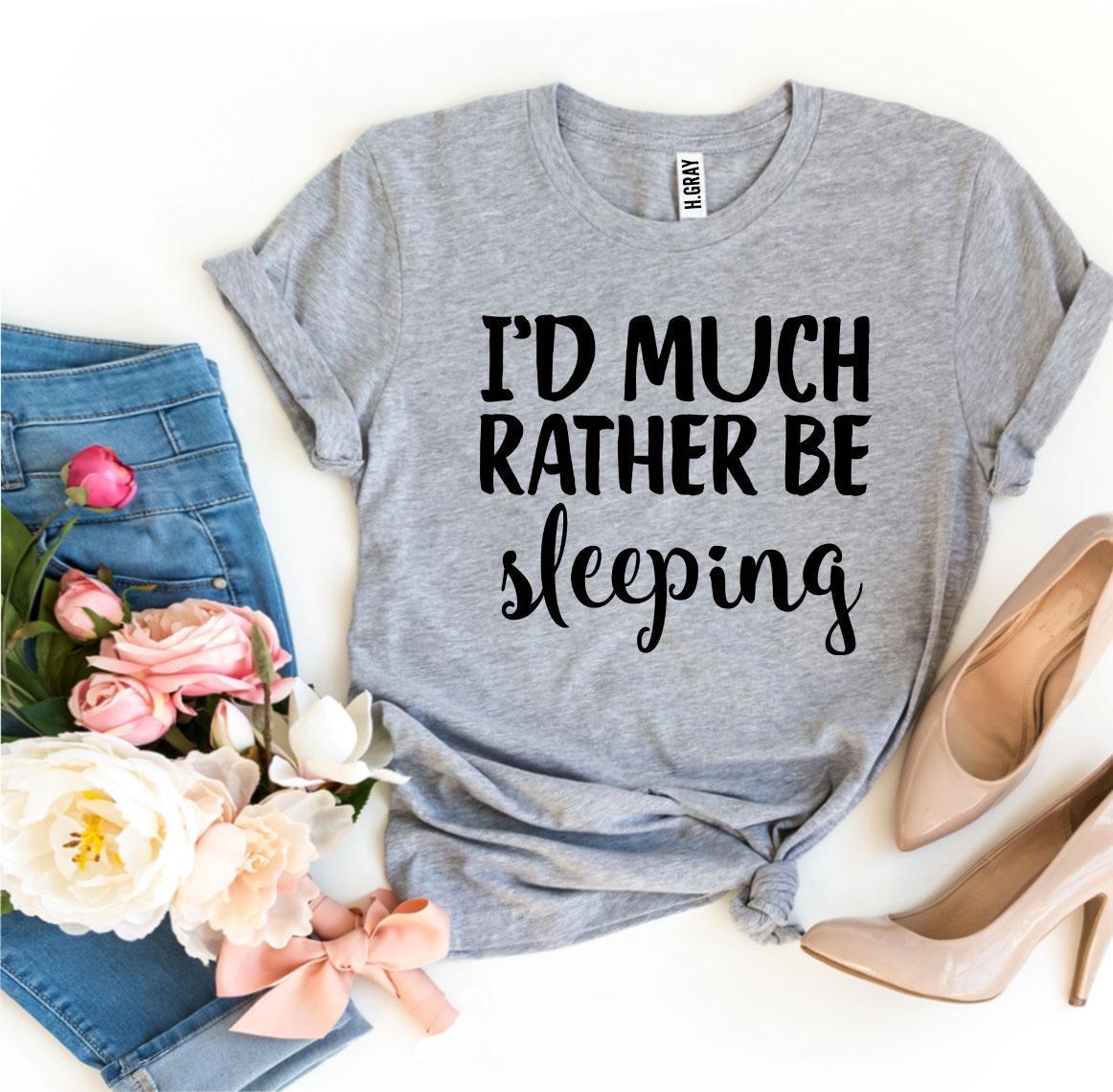 I’d Much Rather Be Sleeping T-shirt in soft ring spun cotton, featuring a vibrant flex print design, available in various sizes.