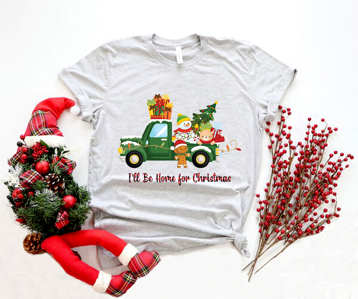Unisex I'll Be Home For Christmas Shirt in various colors, showcasing its soft fabric and festive design.