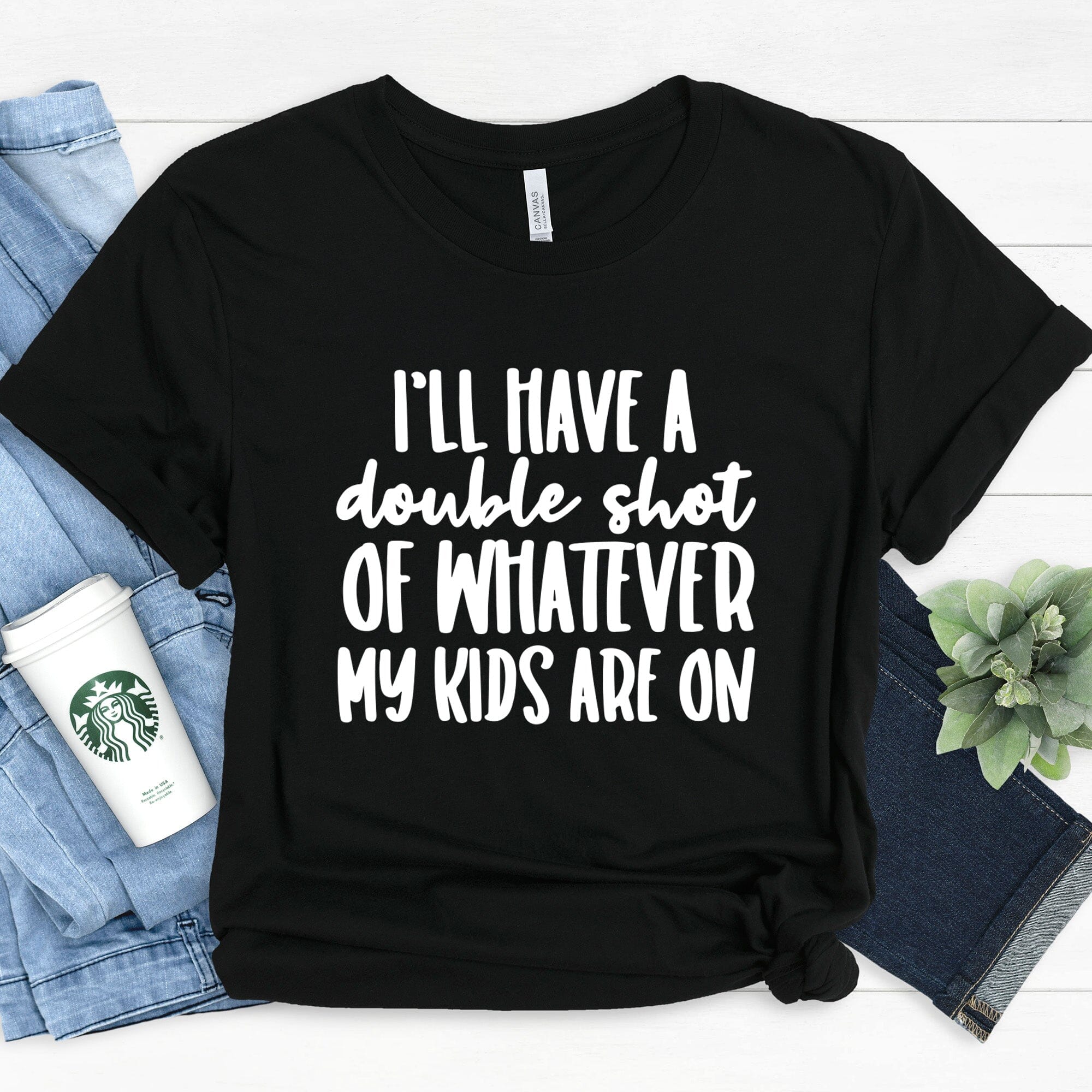 A stylish women's t-shirt featuring the phrase 'I'll Have a Double Shot of Whatever My Kids Are On', made from soft Ringspun Cotton.