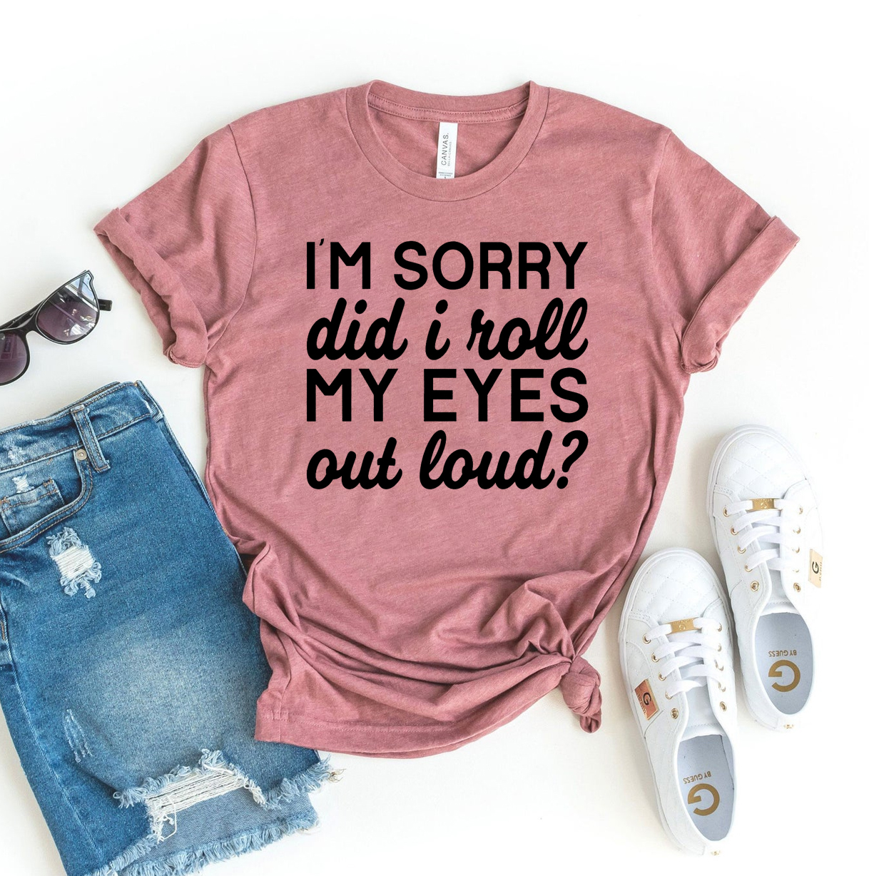 A humorous black t-shirt featuring the phrase 'I'm Sorry Did I Roll My Eyes Out Loud' in stylish print, made from soft ring spun cotton.