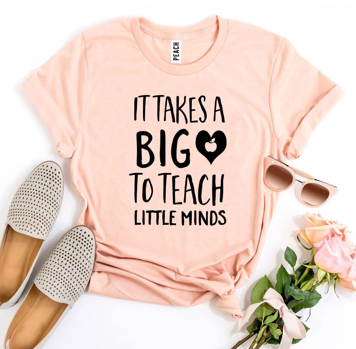 It Takes a Big Heart To Teach Little Minds T-shirt displayed on a mannequin, showcasing its soft cotton fabric and vibrant print.