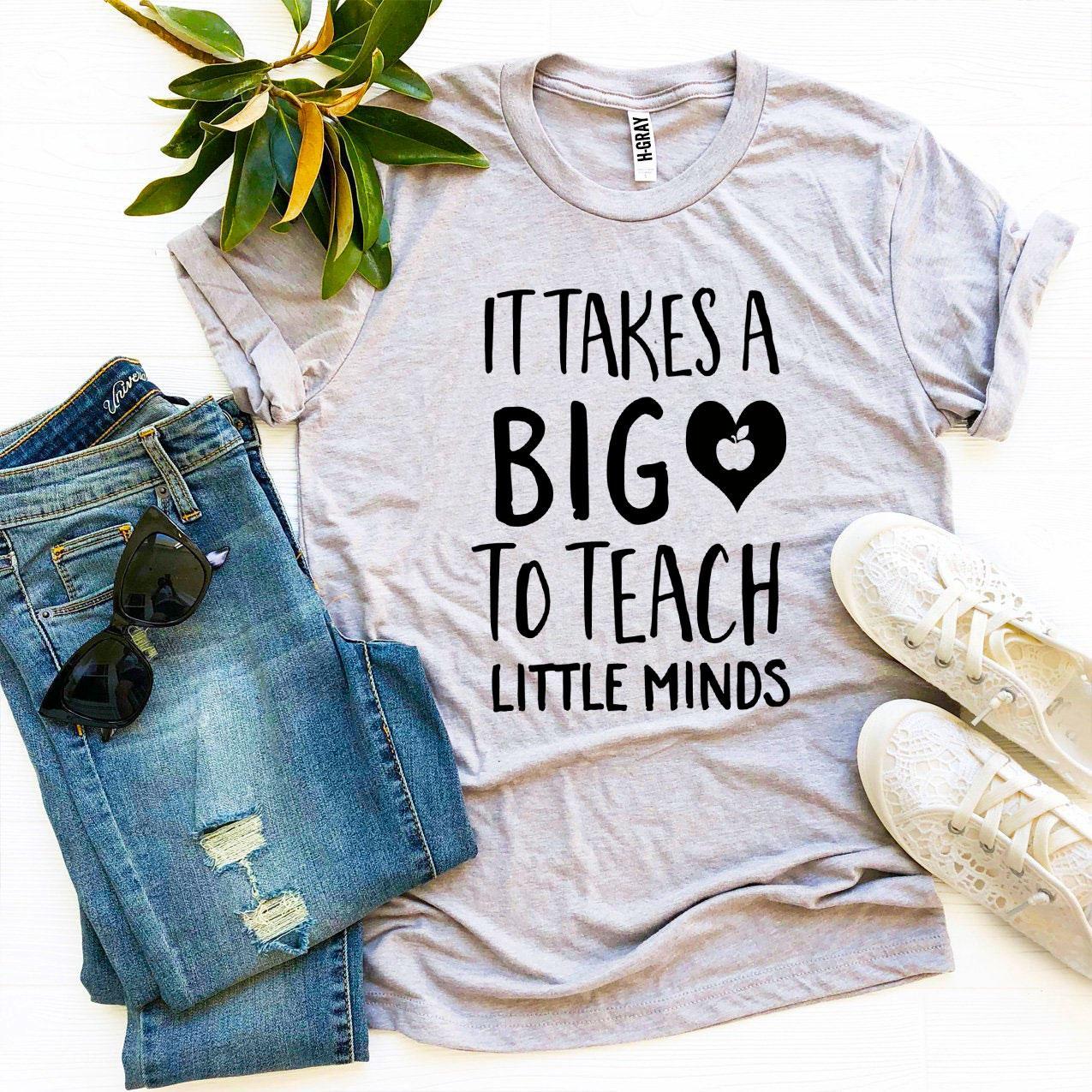 It Takes a Big Heart To Teach Little Minds T-shirt displayed on a mannequin, showcasing its soft cotton fabric and vibrant print.