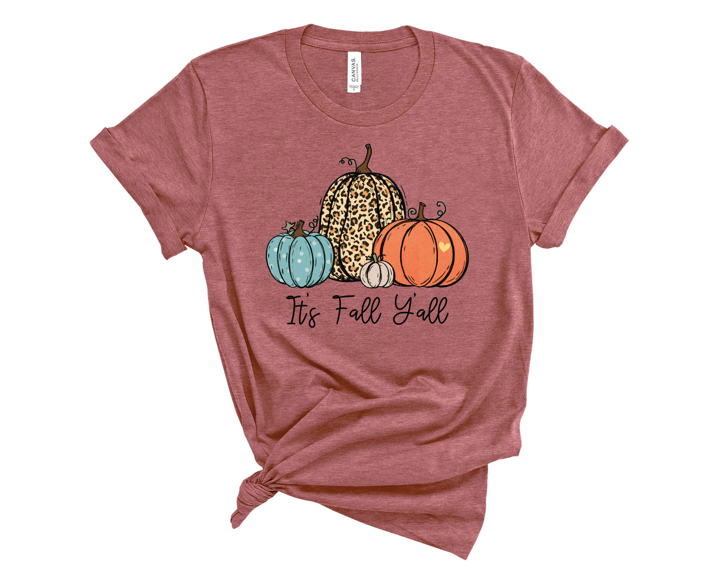 A stylish unisex graphic tee featuring a leopard print pumpkin design, perfect for fall celebrations.