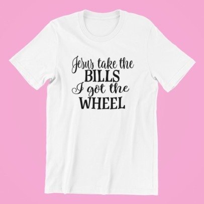 A stylish unisex shirt featuring the phrase 'Jesus Take The Bills, I Got The Wheel' printed on a soft cotton fabric.