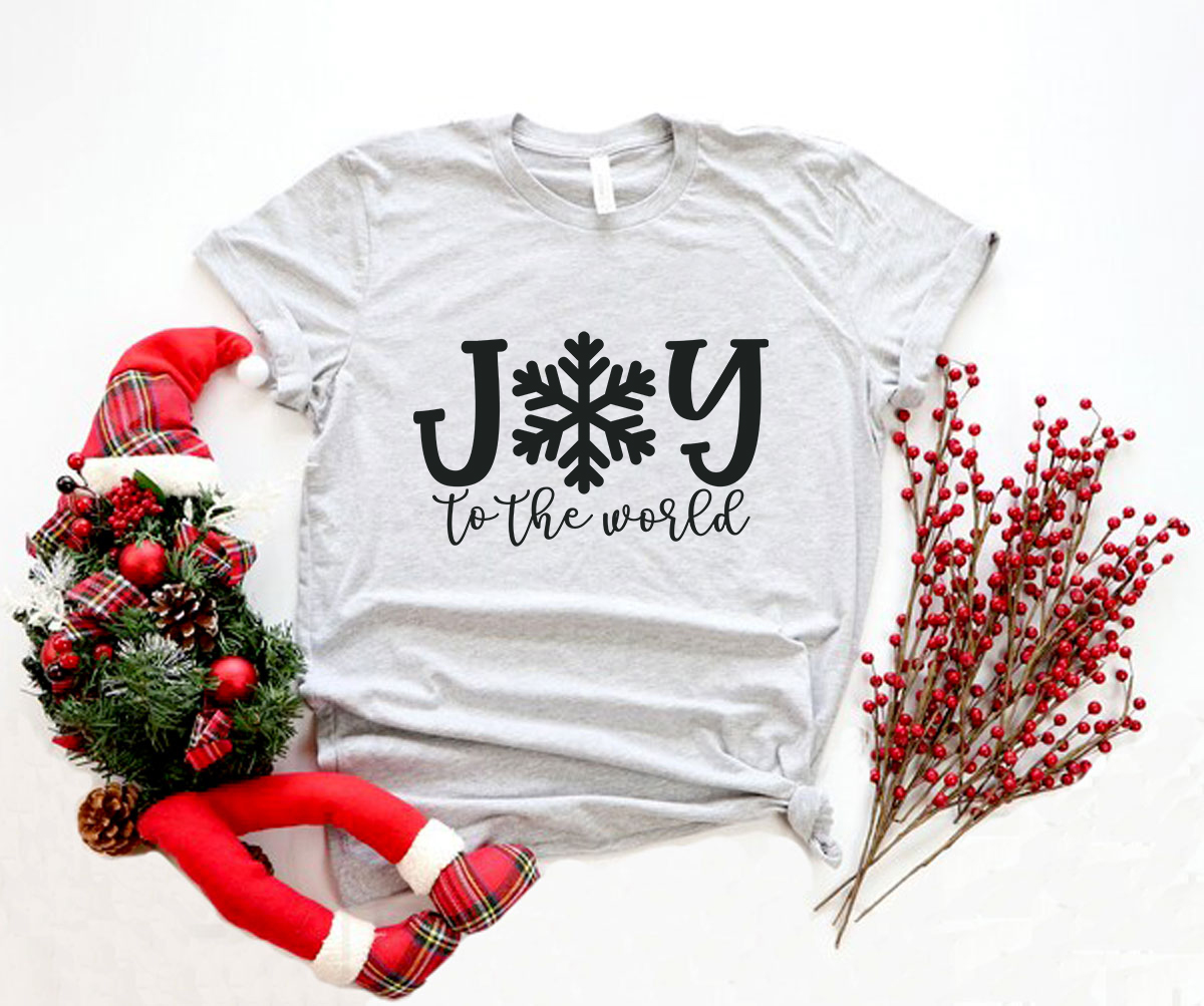 Joy Of The World Shirt displayed in multiple colors, showcasing its soft fabric and classic crew neck design.