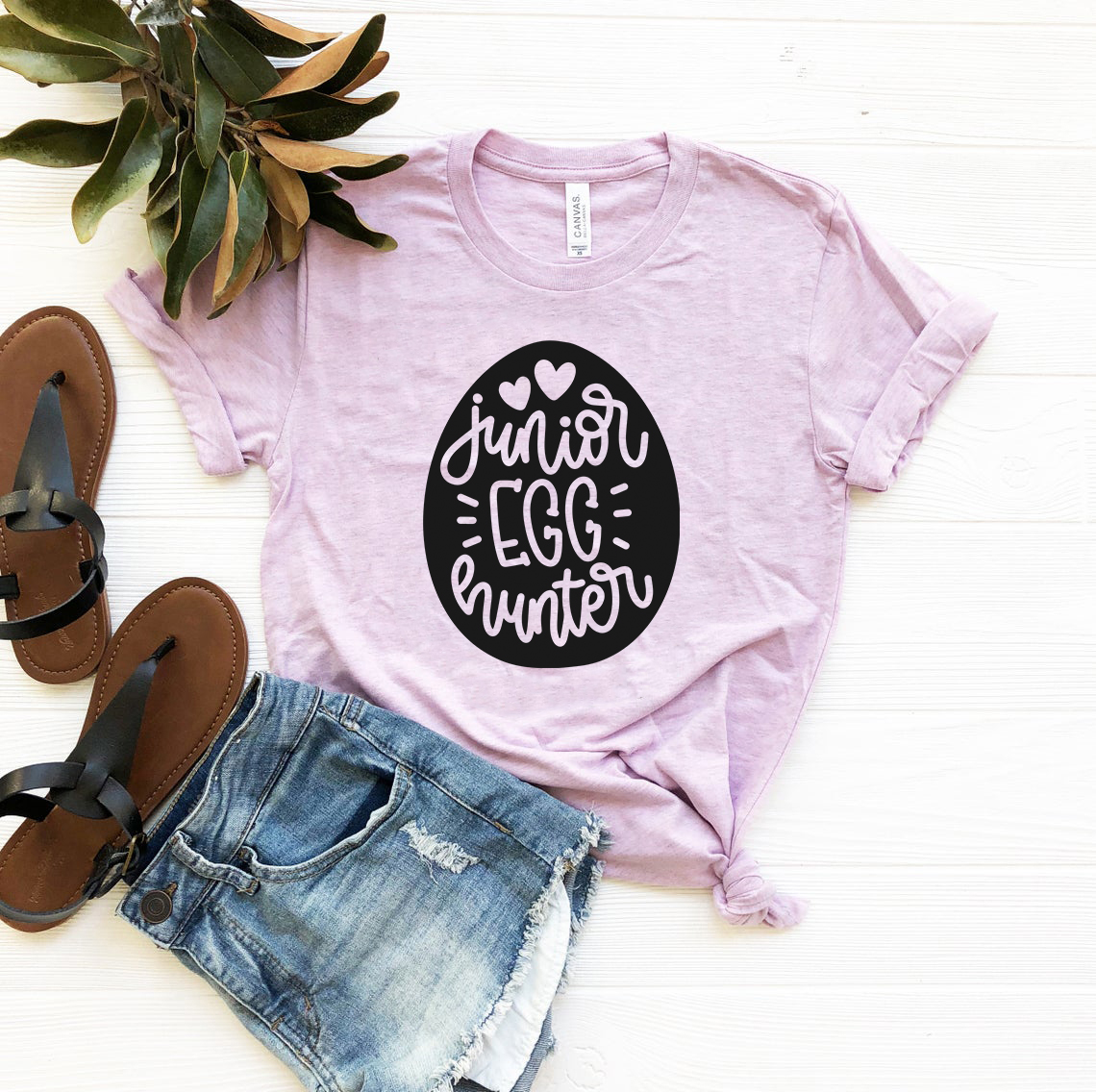 Junior Egg Unisex T-shirt in various colors, showcasing its soft fabric and stylish design.